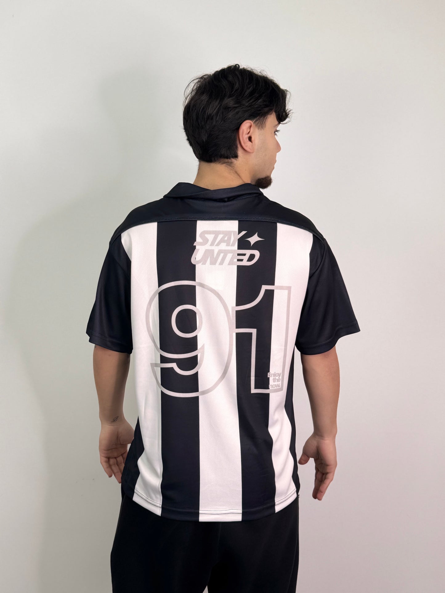 T-shirt sportiva con colletto